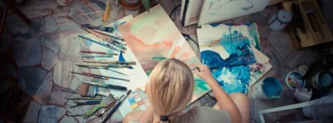 graphicstock-beautiful-blonde-woman-painter-in-her-studio_hxz4lfczeb.jpg